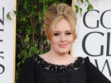 adele feels too young for an autobiography