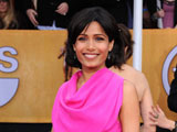 haven t forgotten my roots says freida pinto