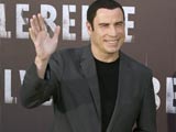 court orders author suing john travolta to pay actor s legal bill