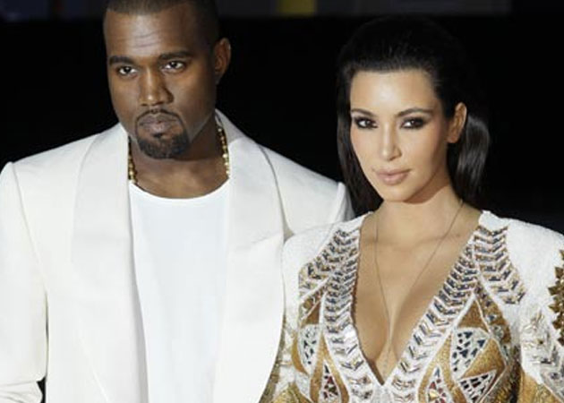 Kanye West, Kim Kardashian visit his mother's grave
