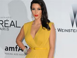 Pregnant Kim Kardashian hires celebrity fitness trainer