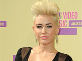 Miley Cyrus has vowed to keep her hair short forever