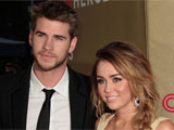 miley cyrus wears engagement ring denies calling off wedding