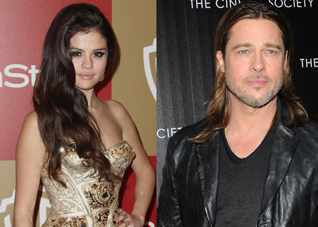 Selena Gomez hid under a table after meeting Brad Pitt