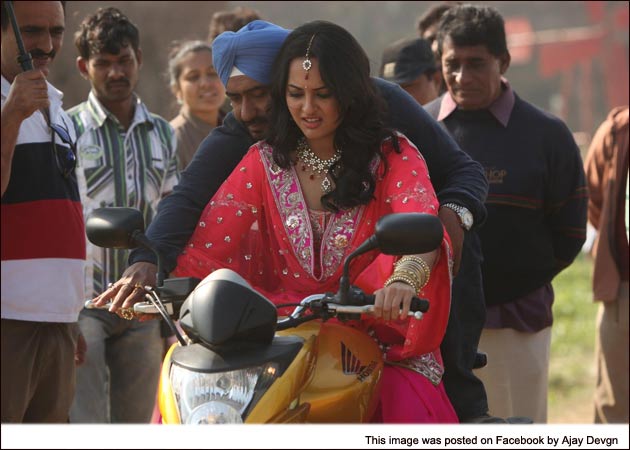 http://cdn.ndtv.com/movies/images/sonakshi-ajay-riding.jpg