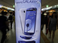 Samsung extends lead over Apple in smartphone race: Poll Samsung-Galaxy-S-III-displayed-thumb.jpg