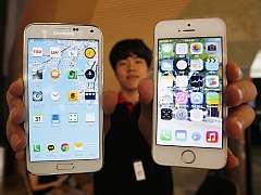 Apple Should Do More to Tackle In-App Purchases Problem: EU apple_iphone_5s_samsung_s5_reuters_small.jpg