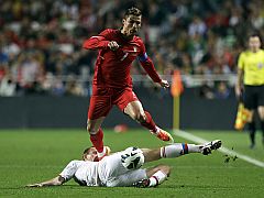 Cristiano Ronaldo Named Riskiest Footballer to Search for: McAfee cristiano_ronaldo_tackling_ap_small.jpg