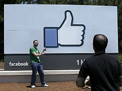 Facebook Becomes Outlet for Religious Anger in Myanmar facebook_like_icon_man_poses_in_front_ap_small.jpg
