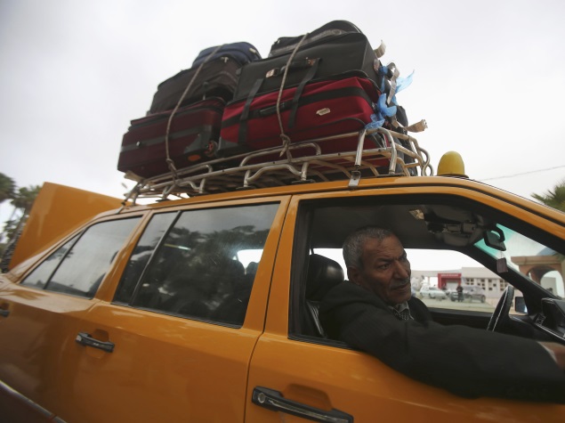 overloaded_taxi_reuters.jpg