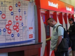 Albanian Hacker Pleads Guilty in $14 Million Global Bank Fraud atm_users_reuters_small_02.jpg