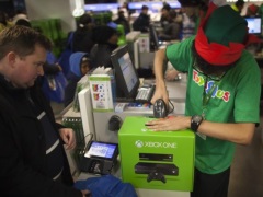 Microsoft Xbox One to Launch in China on 23 September man_buying_xbox_one_reuters_small.jpg