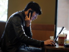 Tor Internet Privacy Service Warns Users It Was Attacked man_mobile_laptop_reuters_small.jpg