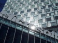 Microsoft, Apple diverge on bankrolling big patent buyer microsoft_office_entrance_reuters_small.jpg