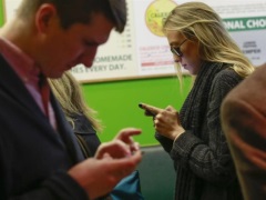 Even Minutes Without a Smartphone Can Fuel Anxiety: Study mobile_users_reuters_small_02.jpg
