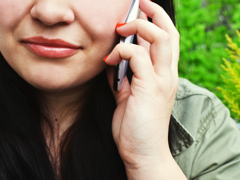 woman_calling_white_phone_pexels.jpg