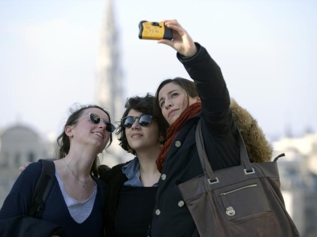 woman_taking_selfie_europe_reuters.jpg