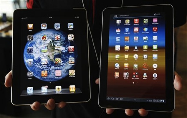 Apple extends gains in surging tablet market: Survey