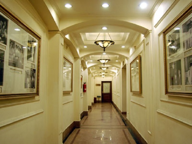 delite_hall_with_old_photos.jpg