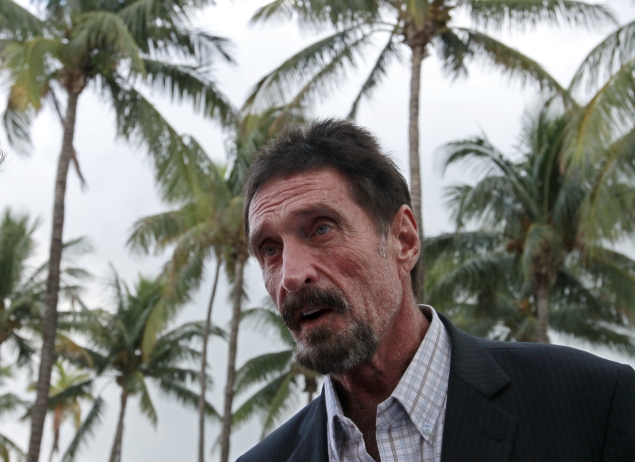 McAfee says will not return to Belize, willing to talk to police