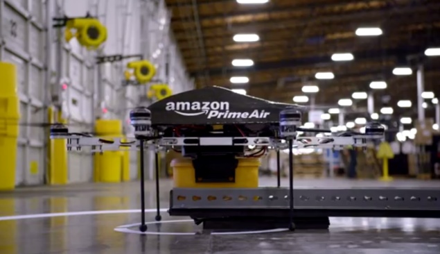 Amazon testing delivery packages using drones, CEO Bezos says