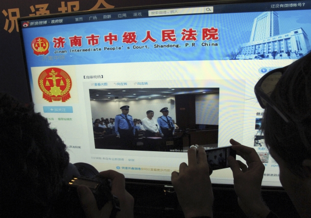 In rare openness, China microblogs disgraced politician's trial