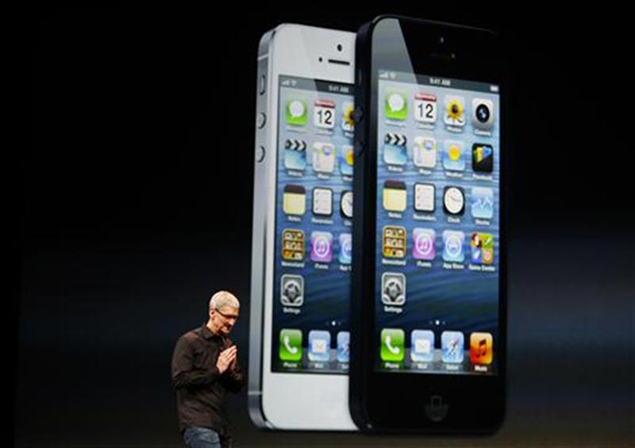 Buoyed by record iPhone 5 pre-orders, Apple shares touch $700