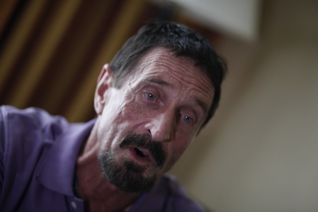 McAfee stable, awaiting deportation in murder probe