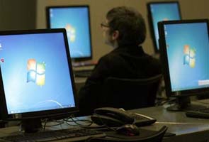 Microsoft pays big to strengthen software defense