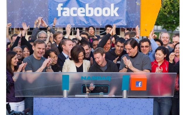 Facebook shares cross $38 IPO price before slipping back