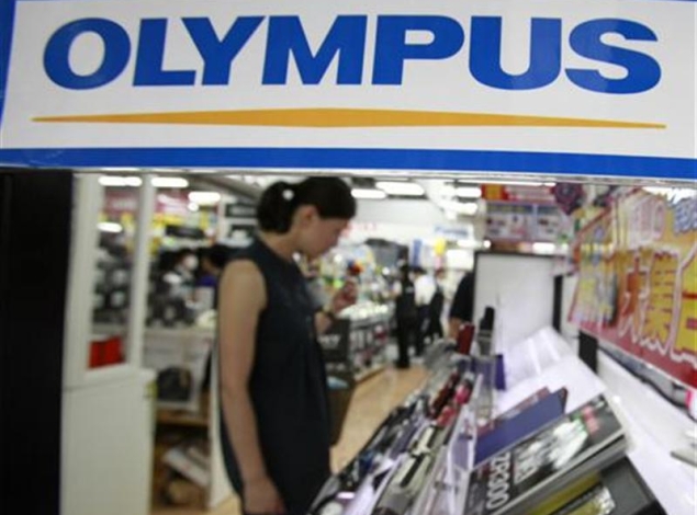 Olympus former executives plead guilty in scandal trial