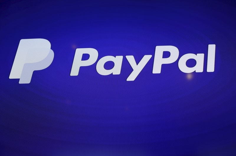 PayPal Seeks to Extend Reach With Visa Tie-Up