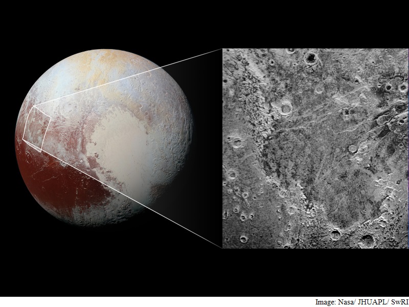 Giant 'Bite Mark' Appears on Pluto's Surface