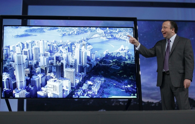 Samsung, LG unveil super-thin, curved OLED TVs