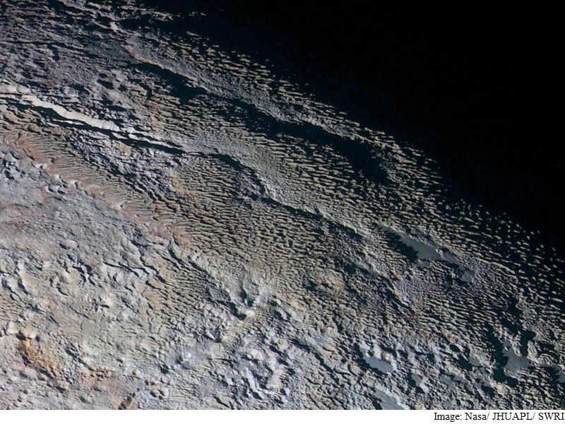 Nasa's Latest Pluto Photos Reveal Snakeskin-Like Surface Features