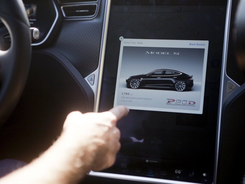 Tesla Unveils Autopilot System, but Don't Let Go of the Wheel