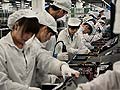 With the world watching, change begins at China's factories