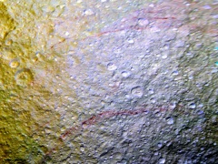 Nasa's Cassini Spacecraft Spots Unusual Red Arcs on Saturn Moon Tethys