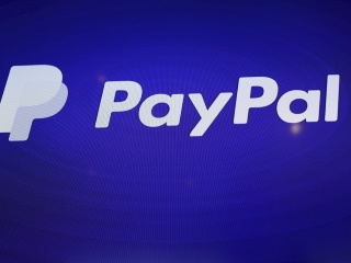 PayPal Seeks to Extend Reach With Visa Tie-Up