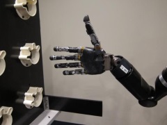 Researchers Enable Paralysed Woman to Control Robotic Arm With Thoughts