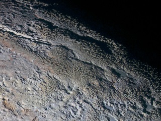 Scientists Dive Into Precious Pluto Data