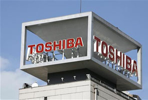 Toshiba cuts forecast on global economy worries