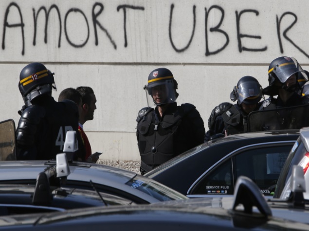 France Cracks Down on Uber After Taxi Driver Protests